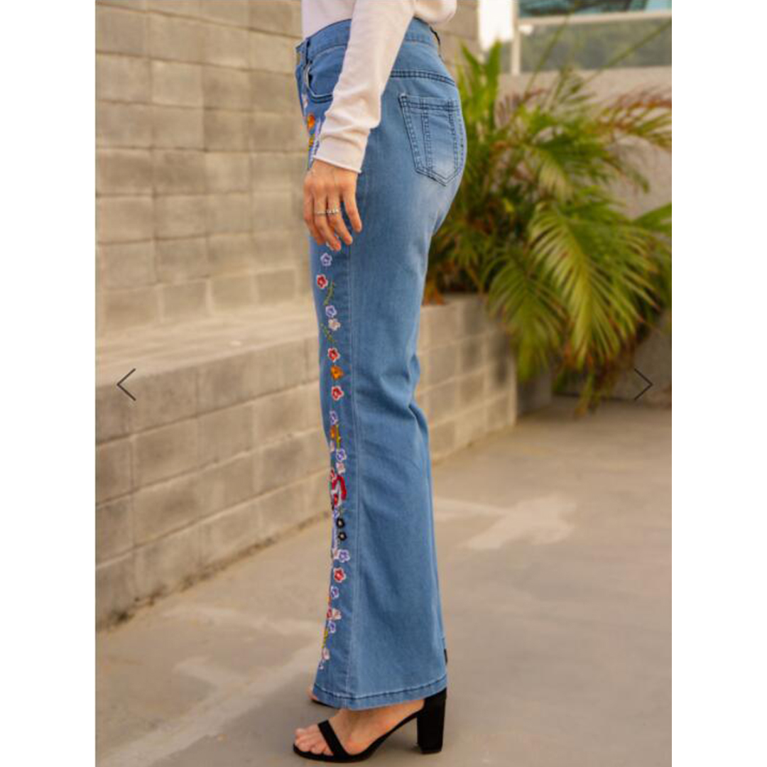 90's Women Retro Blue Floral Flare Jeans - Model Photo
