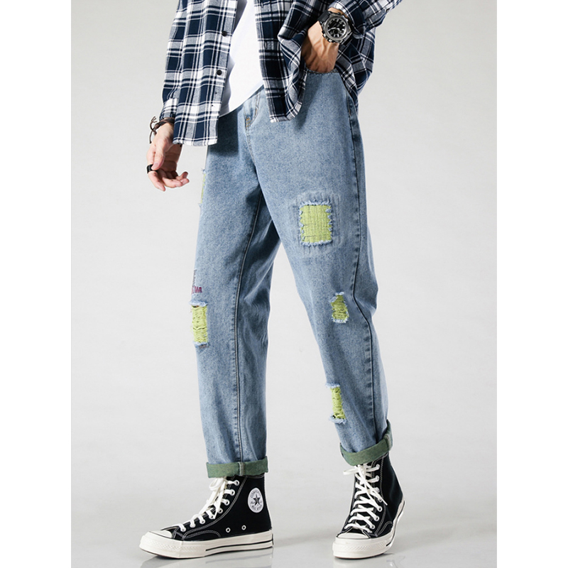 Mens Light Blue Patched And Distressed Ripped Jeans - Model Photo